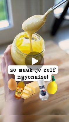 a person holding a spoon with some food in it and the words, 20 mak je zef mayonaise