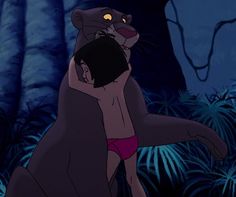 the jungle book character is being hugged by an animal