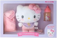 the hello kitty doll is in its box