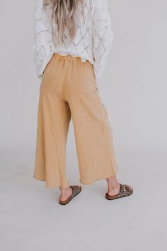 Cute pants that are fun, funky, and boho-comfy too?! “Yes” to a wide-leg silhouette with a draw-string waist in soft French Terry. Vintage fade make these a casual favorite while visible seams, cropped raw-edges, and outline pockets add to the relaxed vibe. Model is 5' 8" and wearing a size small. Measurements for size small. Length: 36" Waist: 28" Un-stretched 24" Inseam Length: 36 1/4" Waist: 30" Un-stretched 24 1/4" Inseam Length: 37 1/2" Waist: 32" Un-stretched 24 1/2" Inseam 80% Cotton, 20% Boho Teacher Outfit, Fit Board, Flattering Pants, Fall Fest, Cute Pants, Fit Board Workouts, Brunch Outfit, Wide Leg Pant, Red Sea