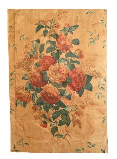 an old wall hanging with flowers on it