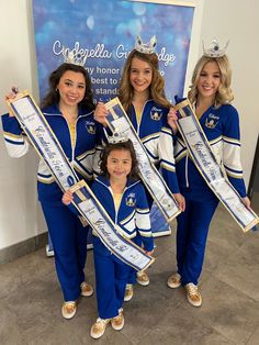 the cheerleaders are posing with their sash