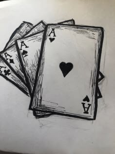 three playing cards with the ace symbol drawn on them