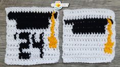 two crocheted squares with black and white designs on them, one has an orange stripe