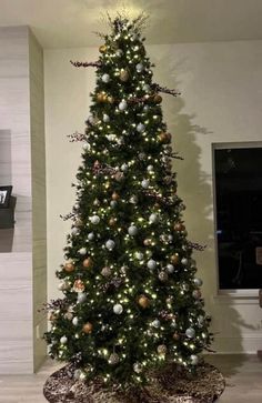 a decorated christmas tree in a living room