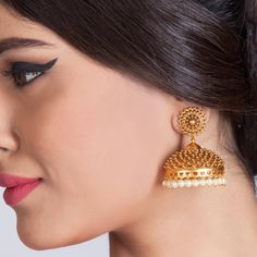 Matar Jhumka Earrings are encrusted with an amazing antique-gold plated brass work that truly make these earrings become of their own. These are as majestic and royal as the ancient Indian palaces. Each piece is handcrafted and made to orders. All the raw material used in this product is of high quality and is handcrafted with love. Specifications: Weight 40 gm; Earrings Length: 5 cm 100% Satisfaction Guarantee: 1 Year Warranty, Long Lasting Plating, High-Quality Stones. Gifting: This pair of ch Indian Things, Gold Jhumka, Jhumka Designs, Jewel Design, Gold Jhumka Earrings, Gold Hoop Earring, Ear Ring, Earrings Design, Gold Ring Designs