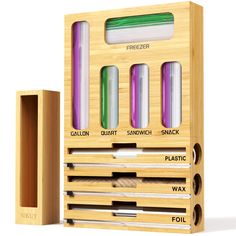 a wooden box with four different colored pencils in it and one is open to show the contents