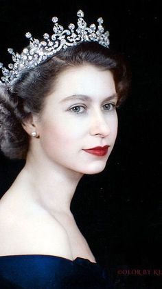 an old photo of a woman wearing a tiara