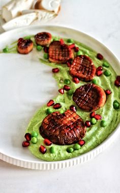 a white plate topped with food on top of a table