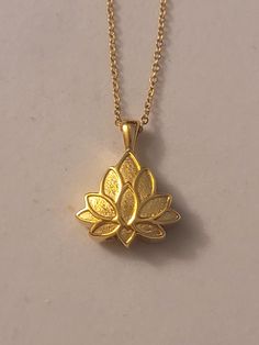 Gold Lotus  Cremation Urn Necklace comes with everything needed to help you get the ashes into the urn at no additional charge.  Comes on a 20 inch gold stainless steel chain. Please feel free to message us with any questions you may have.  Thank you so much. Human Remains, Gold Lotus, Urn Necklace, Urn Necklaces, Cremation Jewelry, Cremation Urns, Memorial Jewelry, Steel Chain, Jewelry Necklace