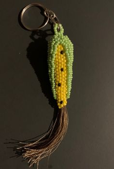 a beaded keychain with a corn on the cob