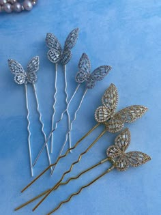 Beauty, elegance and style - all in one little hair pin with shining butterfly! Shiny butterfly might be a good decoration for a little princesses hairstyle or any other hairdo. This hair pin looks very cute and pretty. It will keep the hair style in place and add elegance at the same time. This hair pin with a shiny butterfly is delicate, feminine and perfect for bridal hairstyles, communion hair or dances. Hair pin is available in gold and silver version with clear of light pink rhinestones wi Butterfly Hair Brooch Lavender, Butterfly Hair Pin, Communion Hair, Butterfly Wedding Theme, Shiny Butterfly, Communion Hairstyles, Jewelry Mood Board, Butterfly Hair Accessories, Bridal Hair Pin