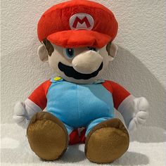 an image of a stuffed toy that looks like mario