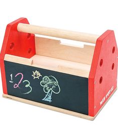 a wooden toy box with chalk writing on it