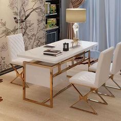 a dining room table with white chairs around it