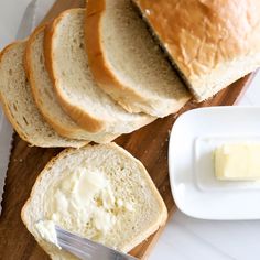 slices of bread and butter on a cutting board