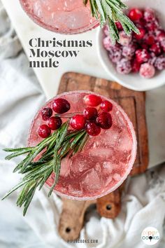 two glasses filled with cranberry christmas moscow