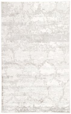 an area rug with white and grey colors on the floor, in front of a white background