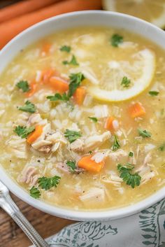 a white bowl filled with chicken and rice soup