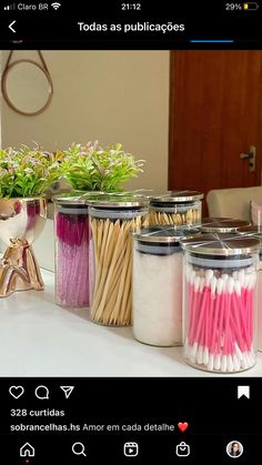 there are many different types of toothbrushes in glass jars