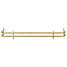 a brass towel rack with two bars on the top and one bar at the bottom