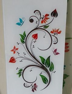 this is an image of a glass panel with flowers and leaves painted on the side