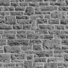 a black and white photo of a brick wall that has been made into a pattern