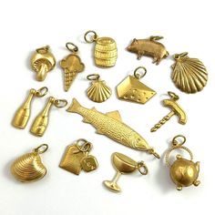 Food & Beverage Themed Charms -Quantity: 1 Charm -Choose your charm from the drop down menu -Mix of vintage and modern brass charms -These also make a fun little gift for someone special! ITEM DESCRIPTION For this choose a charm listing, I went with a food and beverage theme!  The charms are a mix of vintage and modern, all brass metal. Many are stampings (slightly dimentional on the front and hollow on the back), a few are puffy (double sided and hollow on the inside), and the rest have a flat Champagne Scallops, Cheese Wine, Pig Food, Pendants For Women, Gifts For Her Birthday, Charms For Bracelets, Brass Charms, Brass Jewelry, Jewelry Inspo