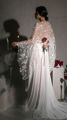 See our real brides on Instagram for the vibes! Introducing the Stargazer Robe, a breathtaking addition to our celestial bridal collection. Crafted from a semi-sheer chiffon base, this robe flows gracefully with every breeze, offering a cool, airy feel against the skin. The back and sleeves are adorned with our signature glow-in-the-dark stars, adding a magical touch that shines beautifully in low light or evening settings. Designed for brides who want to embrace the wonder of the night sky, the Stargazer Robe is perfect for getting ready or as a unique statement piece for photoshoots. Light, dreamy, and enchanting, it’s a robe that captures the beauty of stargazing on a clear, endless night. Key Features: Semi-sheer chiffon base with a light, cooling feel Glow-in-the-dark stars on back an Dark Stars, Endless Night, Bridal Robe, Dark Star, Bridal Robes, Sheer Chiffon, The Night Sky, Real Brides, Low Light