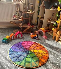 a room filled with lots of toys on the floor