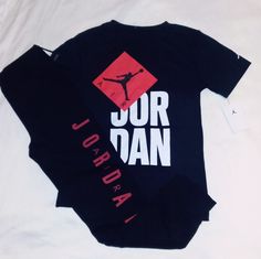 Brand New Never Worn With Tags. Jordan Set Includes A Black Short Sleeve Cotton Blend Tee With Red And, White Trim And Classic Jordan Jumpman Print With "Air Jordan" Inscription And Jumpman Logo On Left Sleeve. Bottoms Are Black Cotton Blend Design With Red Trim With Elastic Waistline And Jumpman Logo On Left Leg. Set Fits Boys Youth Large (12- 14 Yrs). Any Questions, Please Contact Me. Thanks! Trendy Crew Neck Streetwear Sets, Trendy Streetwear Set With Crew Neck, Red Crew Neck Sets With Letter Print, Red Letter Print Crew Neck Set, Casual Red Sets With Graphic Print, Sports Graphic Print Crew Neck Sets, Graphic Print Crew Neck Sports Set, Sporty Streetwear Sets With Graphic Print, Trendy Black Crew Neck Sets