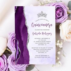 a purple and silver wedding suite with roses on the side is featured in this image