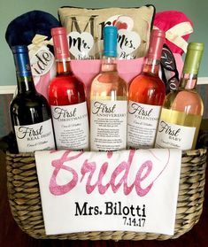 a basket filled with wine bottles sitting on top of a table