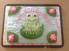 a birthday cake with a frog on it