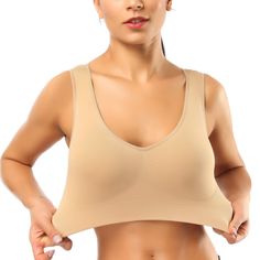 PRICES MAY VARY. MEDIUM SUPPORT BRA: Wide elastic straps and wide band hem provide support for your bust, best choice for low impact sports and daily wear, set free for your breast. SUPER COMFORT: This comfortable bras is super soft, there will be no more struggle with your everyday bra , Say good bye to discomfort , pinching , itching & Scratching. ADDED STRETCH: This sleep bra has been added stretch, it is so elastic that will fit not only small women but also large bust women and girls with n Bras For Older Women, Back Yoga, Wireless Sports Bra, Sports Bra Design, Slip Shorts, Sleep Bra, Good Bye, Comfortable Bras, Low Impact Workout