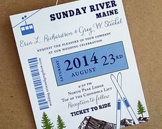 a ticket for a ski resort is hanging on a brown paper with blue and white stripes