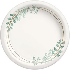 a white paper plate with green leaves and gold trimmings on the rim, against a white background