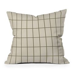 a white and green pillow on a white background with lines in the middle, along with an olive green stripe down the side