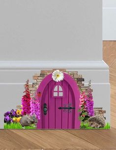 an image of a purple door with flowers and animals in the grass behind it on a wood floor