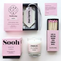 the contents of a candle, soap and matches are laid out next to each other