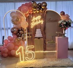 a birthday party with balloons, cake and decorations