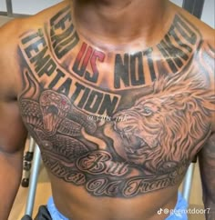 a man with a lion tattoo on his chest