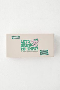 a white box with green lettering on it that says, let's drink to that