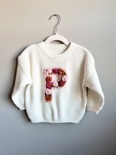 Hand-embroidered Floral Initial Baby/toddler Monogram Sweater - Etsy White Long Sleeve Sweater With Floral Applique, White Floral Applique Sweater For Fall, Monogram Sweater, Keepsake Gifts, Gender Reveals, Floral Initial, Monthly Milestone, Pregnancy Announcements, River Falls