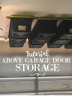 the above garage door storage bins are hanging from the ceiling