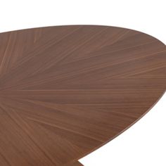 an oval wooden table with wavy lines on the top and bottom, against a white background