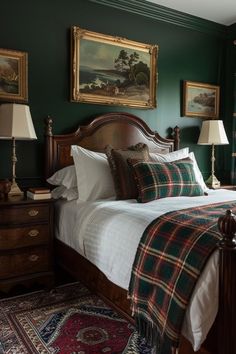 a bed in a bedroom with green walls and plaid blankets on the bedspread