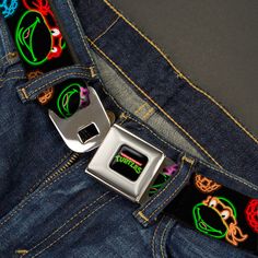 the belt is decorated with colorful designs on it's back pocket and has a metal buckle