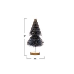 a small christmas tree is shown with measurements