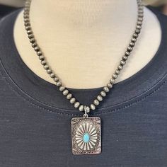 The At The Arena Necklace is a 18 Navajo Pearl Strand Necklace with a square stamped concho pendant with a turquoise stone in the center. It has a 3 adjuster clasp. This necklace is super classy! Turquoise Jewelry Western, Iron Necklace, Western Fashion Jewelry, Western Bracelets, Texas Western, Cactus Necklace, Jewelry Western, Three Necklaces, Western Necklaces